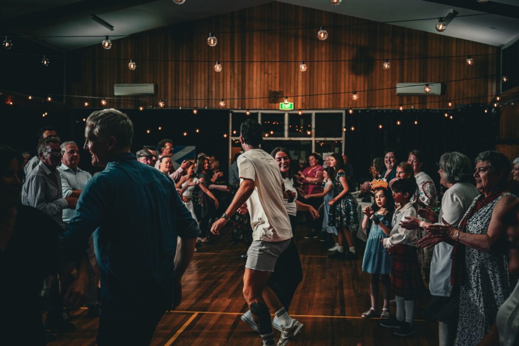 Smiles all round as we fill the room for an Orcadian Strip the Willow at Hogmanay Hootenanny 2024